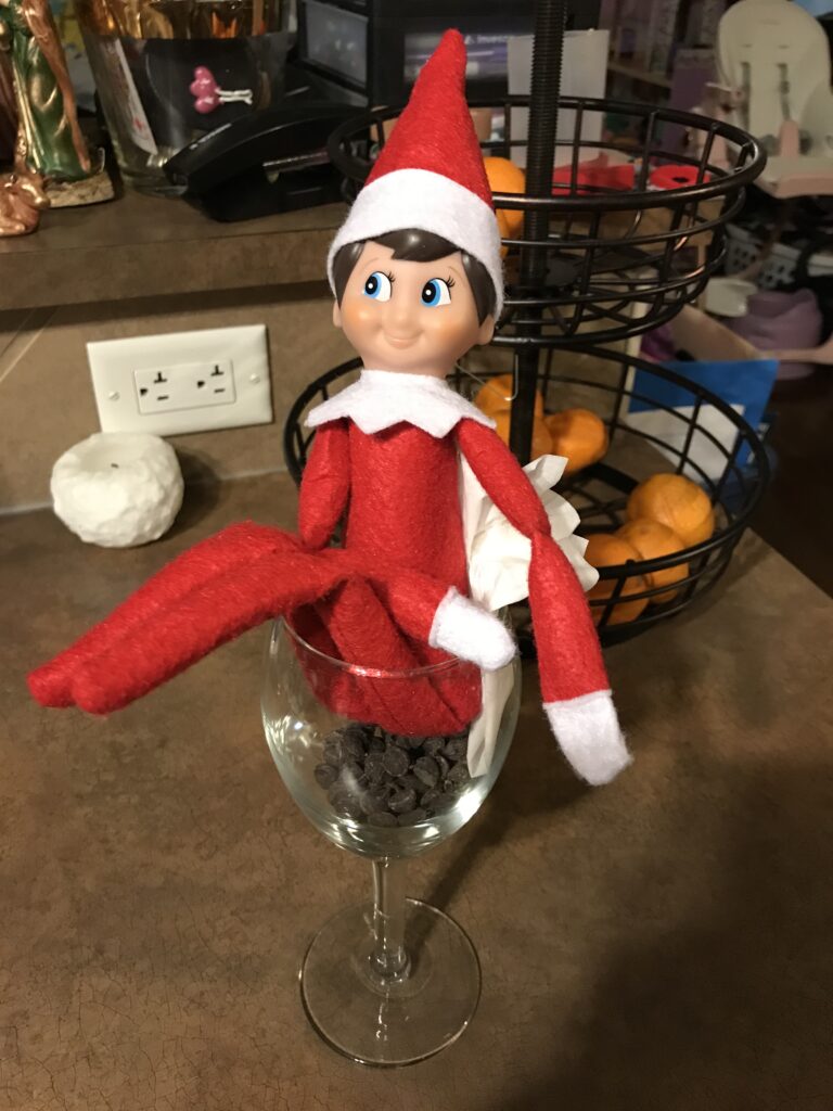 Frosty pooping in a wine glass.