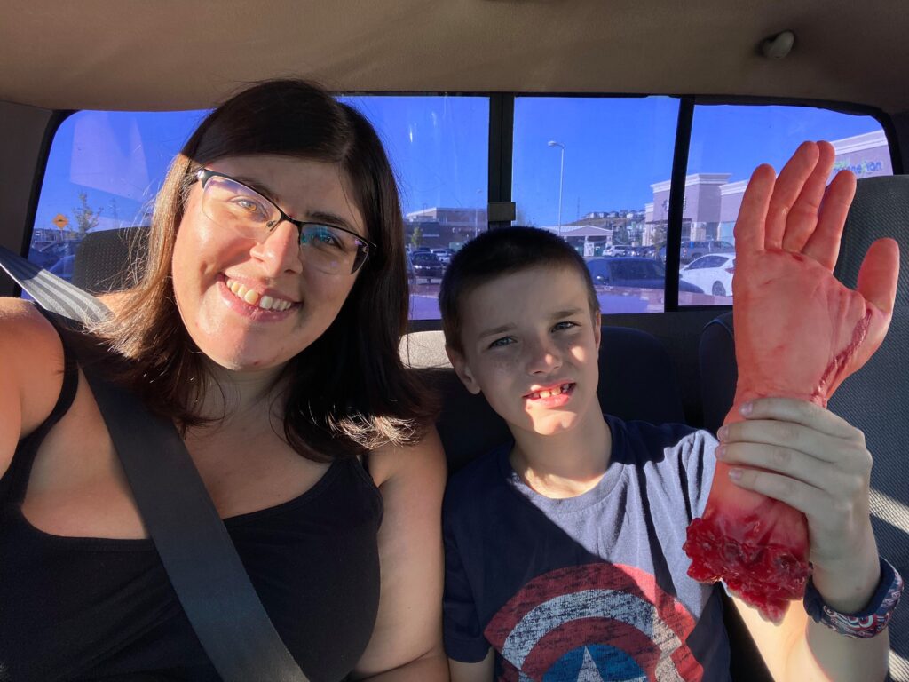 Zaden and I with Fred the hand a Halloween decoration.