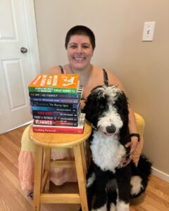 Reading books, Shadow my Bernedoodle dog and I.